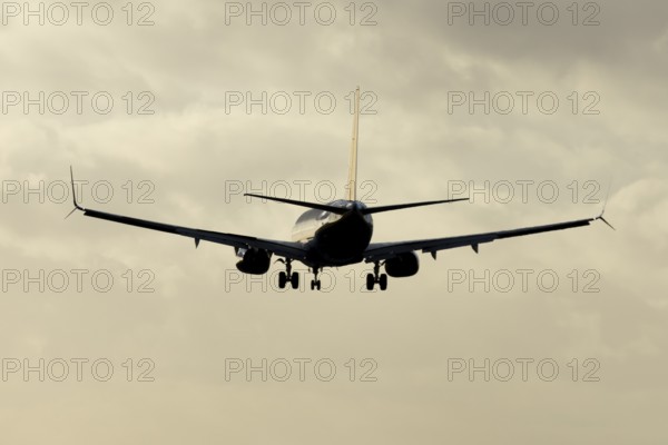 Boeing 737 commercial passenger airliner jet aircraft of Ryanair airways in flight on approach to