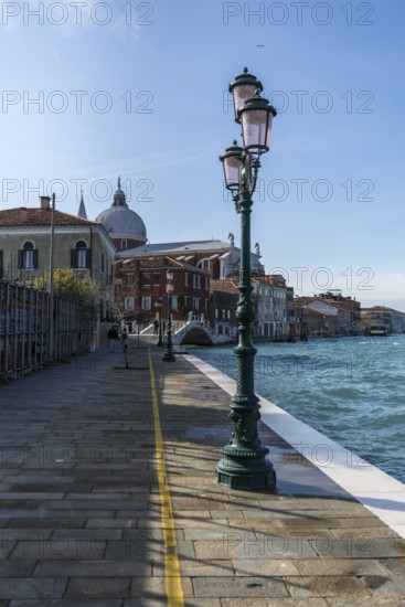Quay overlooking Chiesa del Santissimo Redentore Church of the Most Holy Redeemer, on Guidecca