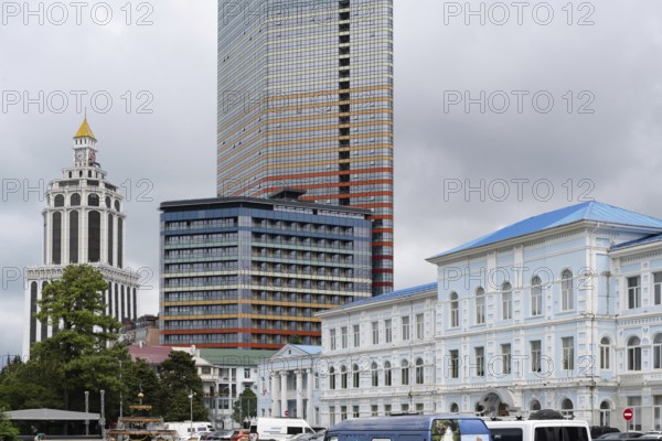 Batumi, Georgia. July 21st 2025. Old traditional style Georgian architecture and modern skyscraper