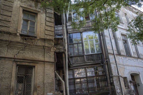 Tbilisi, Georgia. September 12th 2025. Traditional wooden and brick built old houses in Tbilisi Old