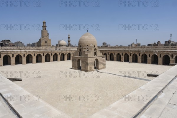 The magnificent architecture of the courtyard, dome and minarets of Ibn Tulun Mosque in Islamic