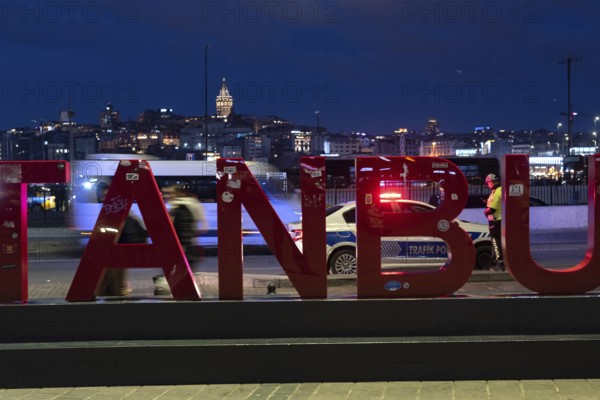Istanbul, Turkey. January 3rd 2025. A busy road at night with a police traffic patrol in the