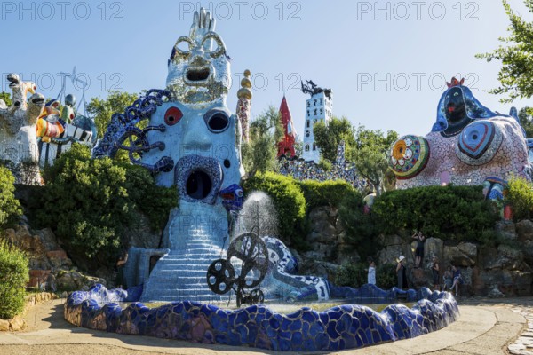 Colourful sculptures made of glass and mirrors, Giardino dei Tarocchi, Garden of Tarot, by Niki de