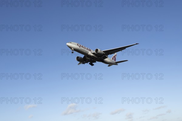 Boeing 777 A7-BFL commercial jet aircraft of Qatar cargo in flight on approach to land at London