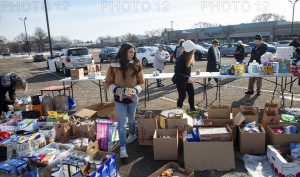 Oak Park, Michigan USA - 14 February 2026 - Volunteers collect food and other items for immigrants