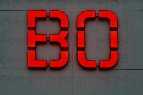 Detailed view of the red BO logo in the evening at the main building of Bochum University, Ruhr