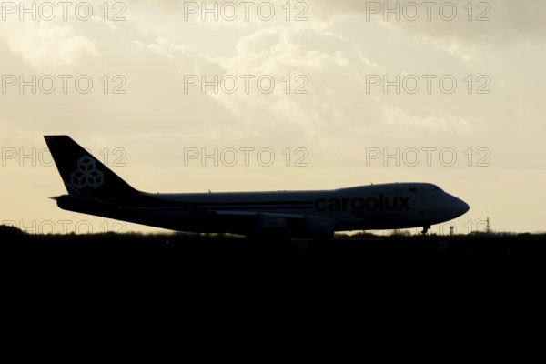 Boeing 747-400 jumbo jet LX-TCV commercial aircraft of Cargolux cargo waiting to take off