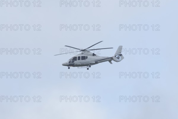 Eurocopter EC-155B-1 Dauphin 2 Airbus Helicopters H155 Helicopter A7-HMD in flight, England, United