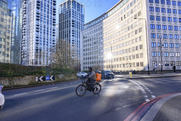 London, UK. January 31st 2025. A typical cycle food delivery guy riding his bike through the