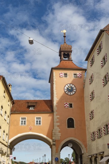 Regensburg, Germany. October 7th 2024 Regensburg Clock Tower at the entrance of the Stone Bridge,