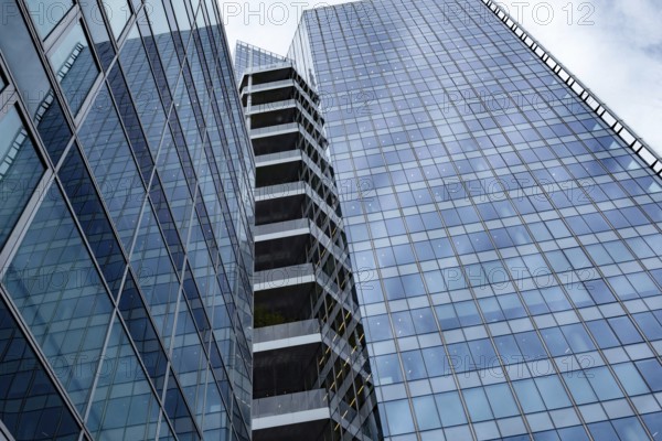 Abstract business architecture of a glass fronted office building in a Paris commercial and