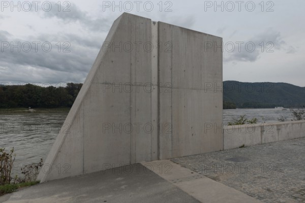 Concrete flood protection walls built as a barrier to prevent excessive flooding of the River