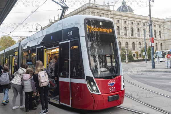 Vienna, Austria October 14th 2024 Passengers boarding 71 Tram the first district Innere Stadt, near