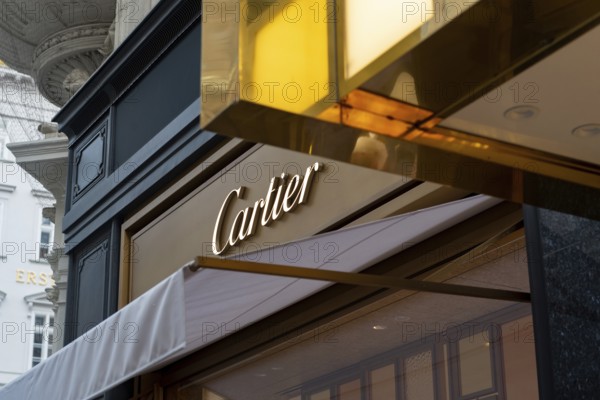 Vienna, Austria. October 15th 2024 Cartier logo and brand sign displayed on a Vienna store front,
