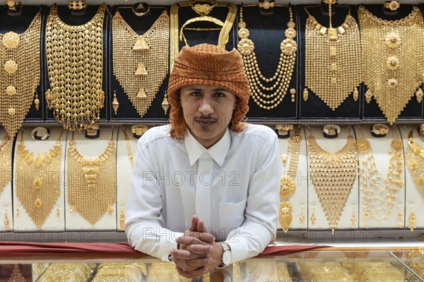 Dubai, United Arab Emirates. July 1st 2019 A young local man working in a jewellery shop in the
