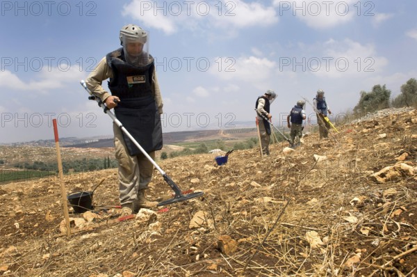 Tyre, Lebanon. July 15th 2010 A team from The Mines Advisory Group (MAG) clearing unexploded