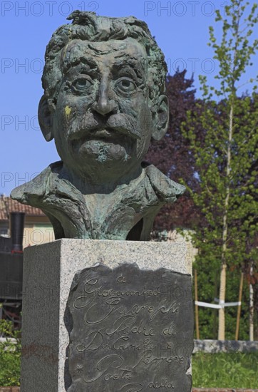Brescello, statue of the writer Giovannino Guareschi in Parco Giovannino Guareschi, author of the