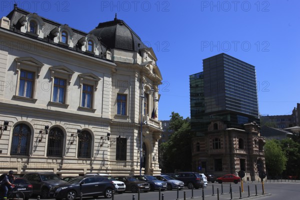 Romania, capital Bucharest, Bucuresti, building near Revolution Square, on the right the House of
