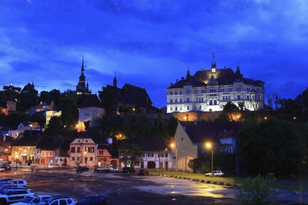 Romania, view of the town hall, monastery church and hour tower in the historic old town of