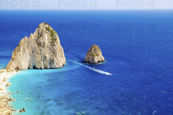 The Mizithres are two spectacular rock formations rising majestically from the azure Ionian Sea off