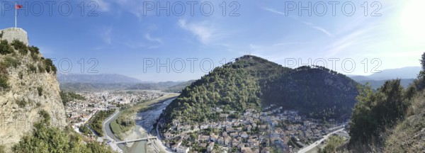 Panorama, panoramic view of a castle, including river and city, in a mountainous green landscape,