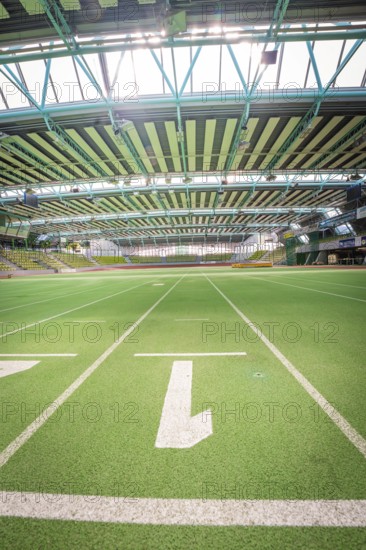 View of the green runway of an extensive indoor sports hall, Sindelfingen Glass Palace, Böblingen