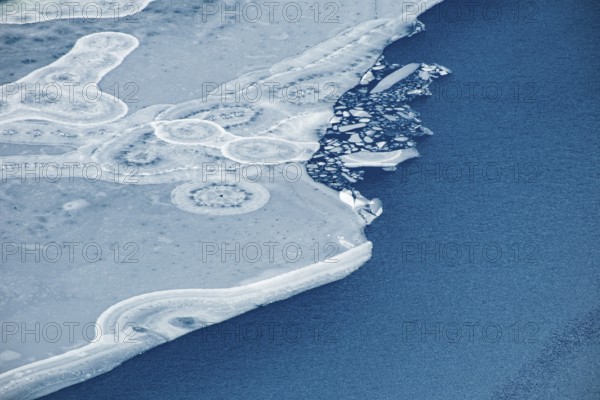 Abstract patterns in the ice of the partly frozen Königssee, detailed view, Berchtesgaden National