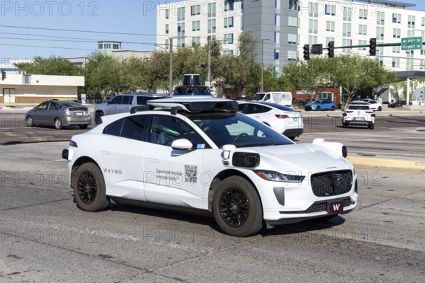Waymo self-driving autonomous vehicle driverless car from Google and Jaguar Robotaxi in Phoenix,