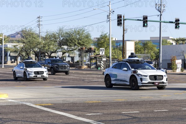 Waymo self-driving autonomous vehicles driverless cars from Google and Jaguar Robotaxi in Phoenix,