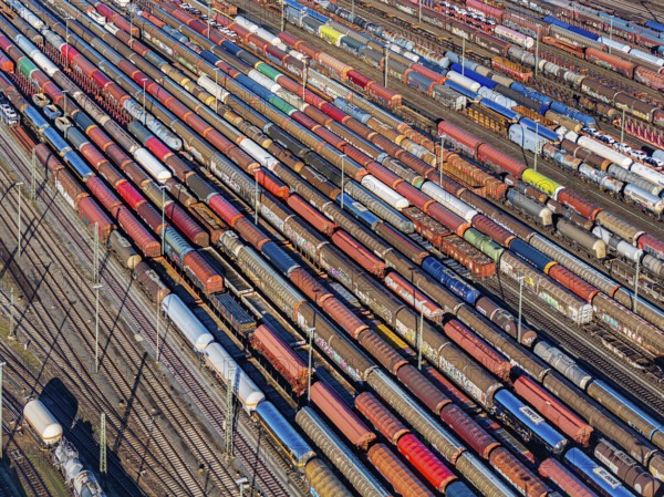 Mannheim marshalling yard. There are many freight trains and freight wagons on the tracks. aerial
