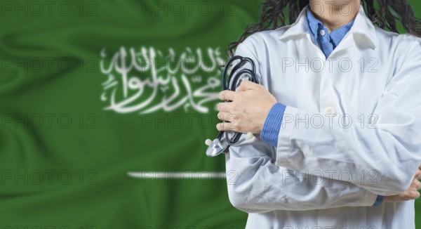 Healthcare professional with Saudi Arabia flag background. Professional doctor holding stethoscope