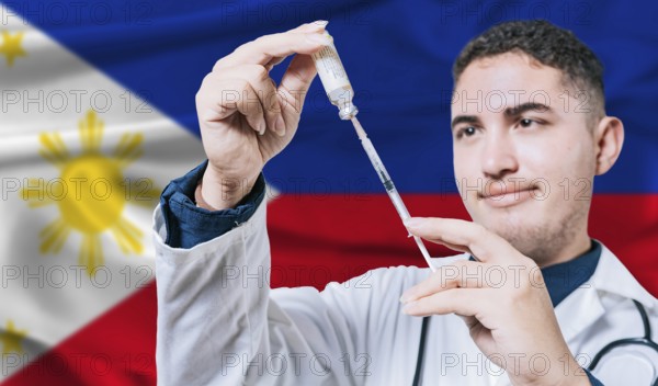 Doctor holding syringe on Philippines flag background. Medical professional holding syringe with