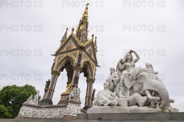 Asian group, neo-gothic Albert Memorial, monument to Prince Albert, wife of Queen Victoria,