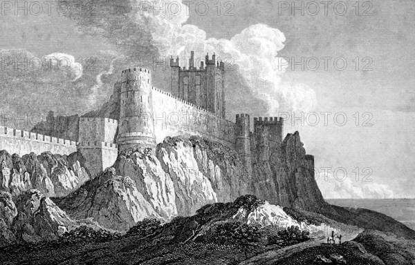 Bamborough Castle or Bamburgh Castle, Northamberland, England, North Sea, shore, rock, square