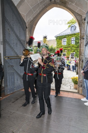 Historic mining day of miners 2025 in Schneeberg, miners of all trades proudly wear their habit on
