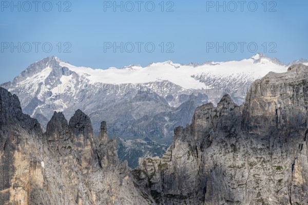 Adamello mountain peak with glacier, in front Brenta Mountains, Brenta-Adamello Natural Park,
