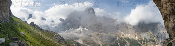 Alpine panorama, fog and Torre Di Brentai and Cima Tosa, rocky mountain peaks and mountain