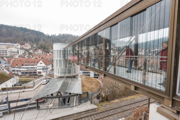 A glazed bridge with a view of the city's buildings, opening of the Hermann Hesse Railway, Calw,