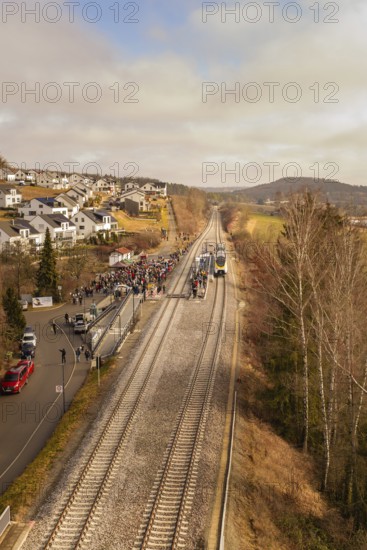 Rural railway line with crowds and a waiting train, opening of the Hermann Hesse Railway, Calw,