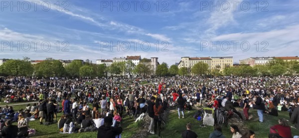 May 1, public holiday, Labor Day in Görlitzer Park in Berlin, many people sitting relaxing on the