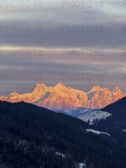 Alpine glow at sunset, mountain peaks of the Loferer Steinberge in winter, Kitzbühel Alps, Tyrol,