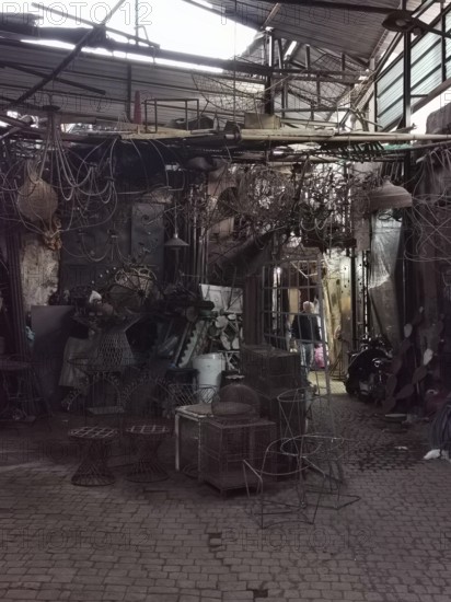 Complex network of cables and metal objects in a workshop in Medina, Morocco