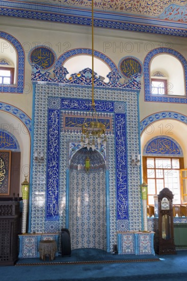 Detailed view of a richly decorated prayer niche in light blue tiles, Kapu Mosque, mosque from the