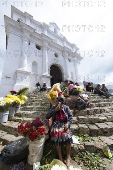 Flower market on the steps of Santo Tomás Church in Chichicastenango, Highlands, El Quiché