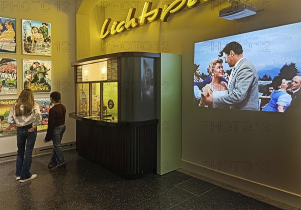 Cinema from the 1950s as a presentation with movie posters, box offices and original films, House