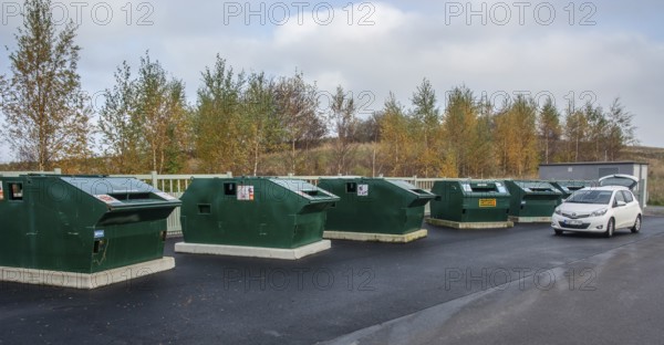 Garbage station with garbage containers for various waste in Ystad, Skåne County, Sweden,