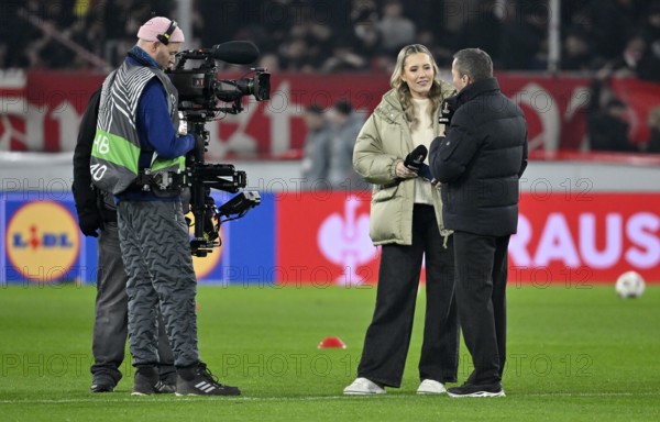 RTL TV expert Lothar Matthäus interviewed with reporter presenter Laura Papendick microphone micro