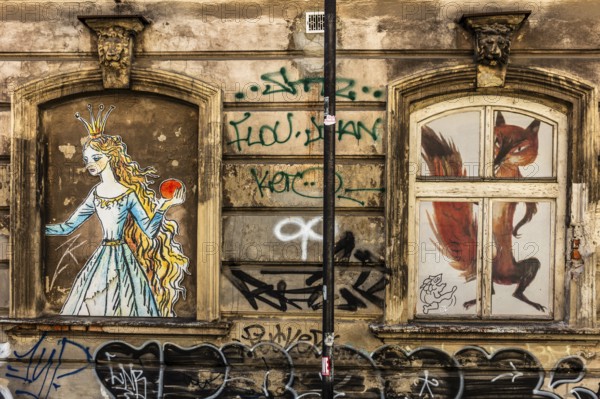 Street art on the wall of a building in the Kazimierz Jewish Quarter, a historically significant,