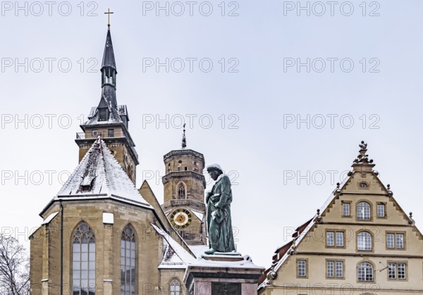Winter in Stuttgart. The city is wintry white early in the morning. Schillerplatz with collegiate