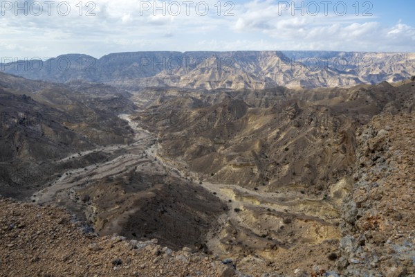 Barren mountains and gorges near Ash Shuwaymiyah, Oman